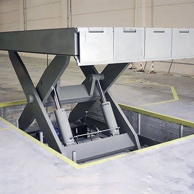 Mesa elevadora de tijera Alapont instalada en zona de carga